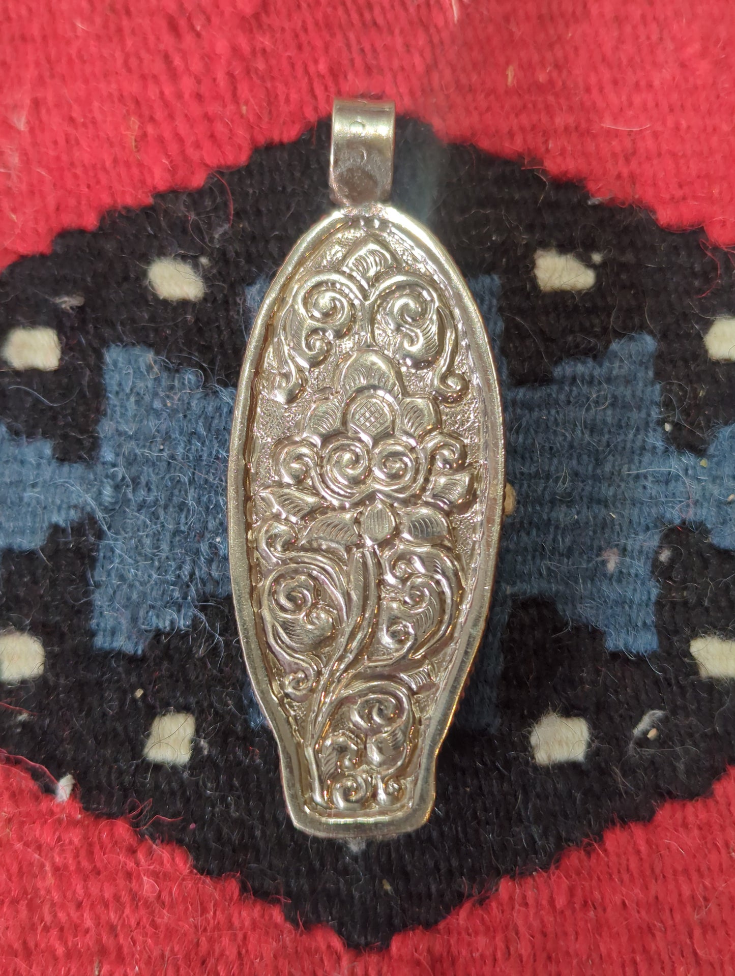 Virgin Mary in Silver Pendant